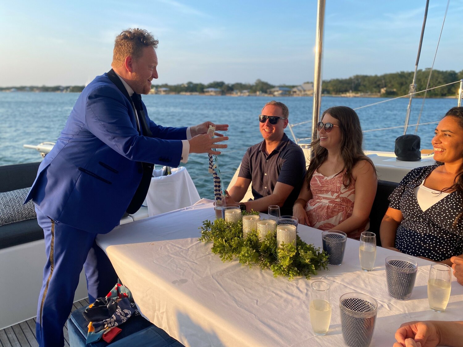 Magician Bill Abbott astounds guests at a recent sailing event.